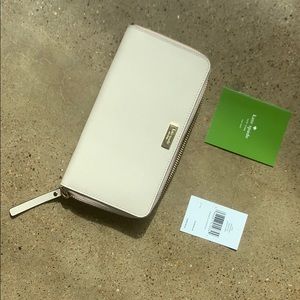 never been used late spade wallet!